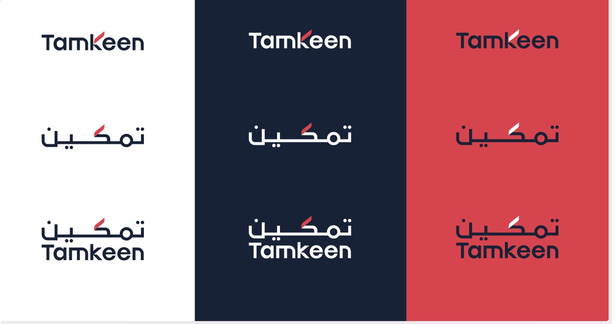 The Tamkeen lockup tested on white, navy and coral backgrounds.